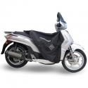 TABLIER COUVRE JAMBE TUCANO POUR KYMCO 125 FLY 2013- (R066-X) (TERMOSCUD) (SYSTEME ANTI-FLOTTEMENT SGAS)